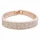 Bracelet large couleur or et strass blancs