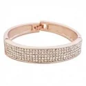 Bracelet large couleur or et strass blancs